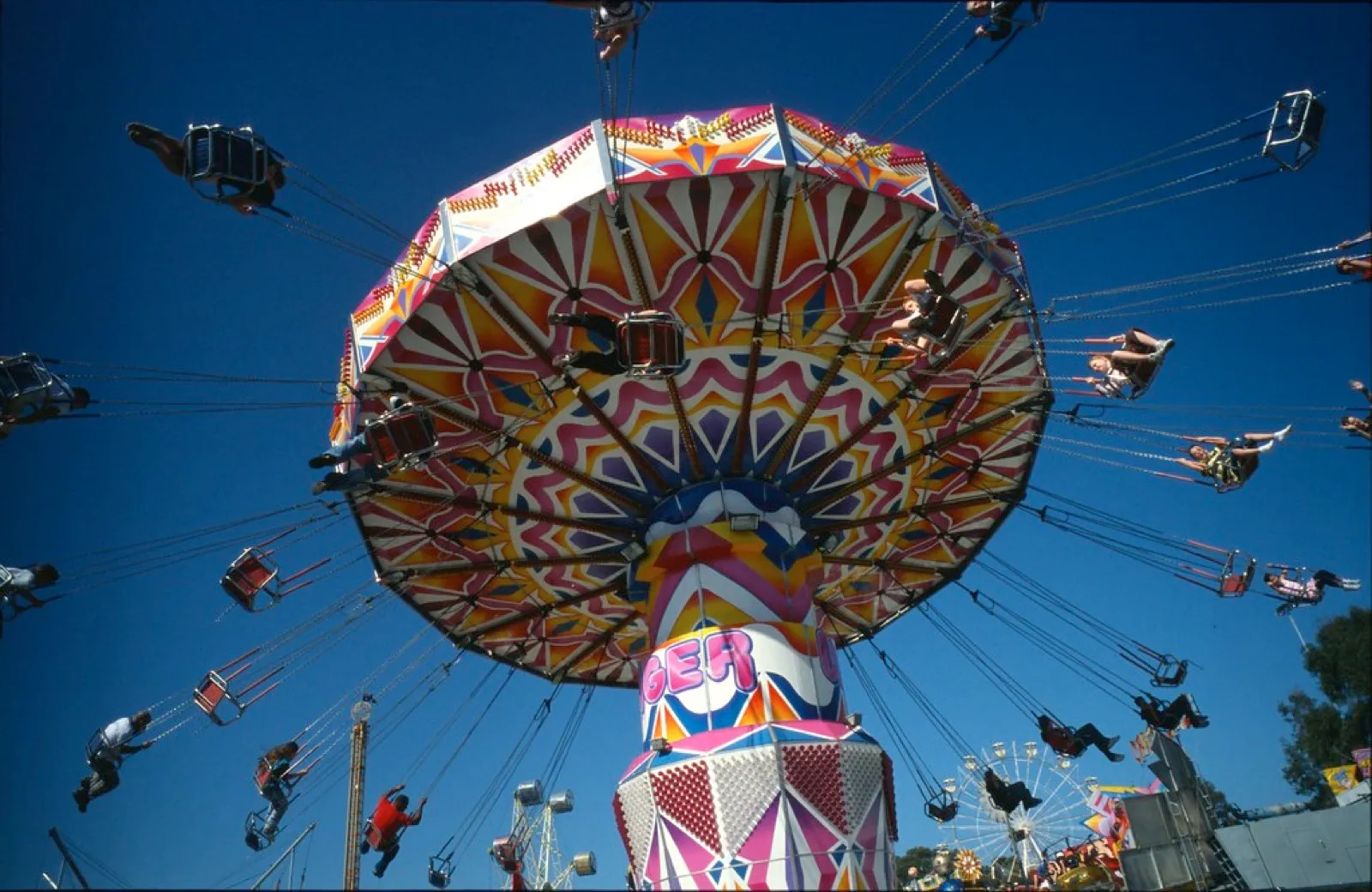 Swing carousel ride from below